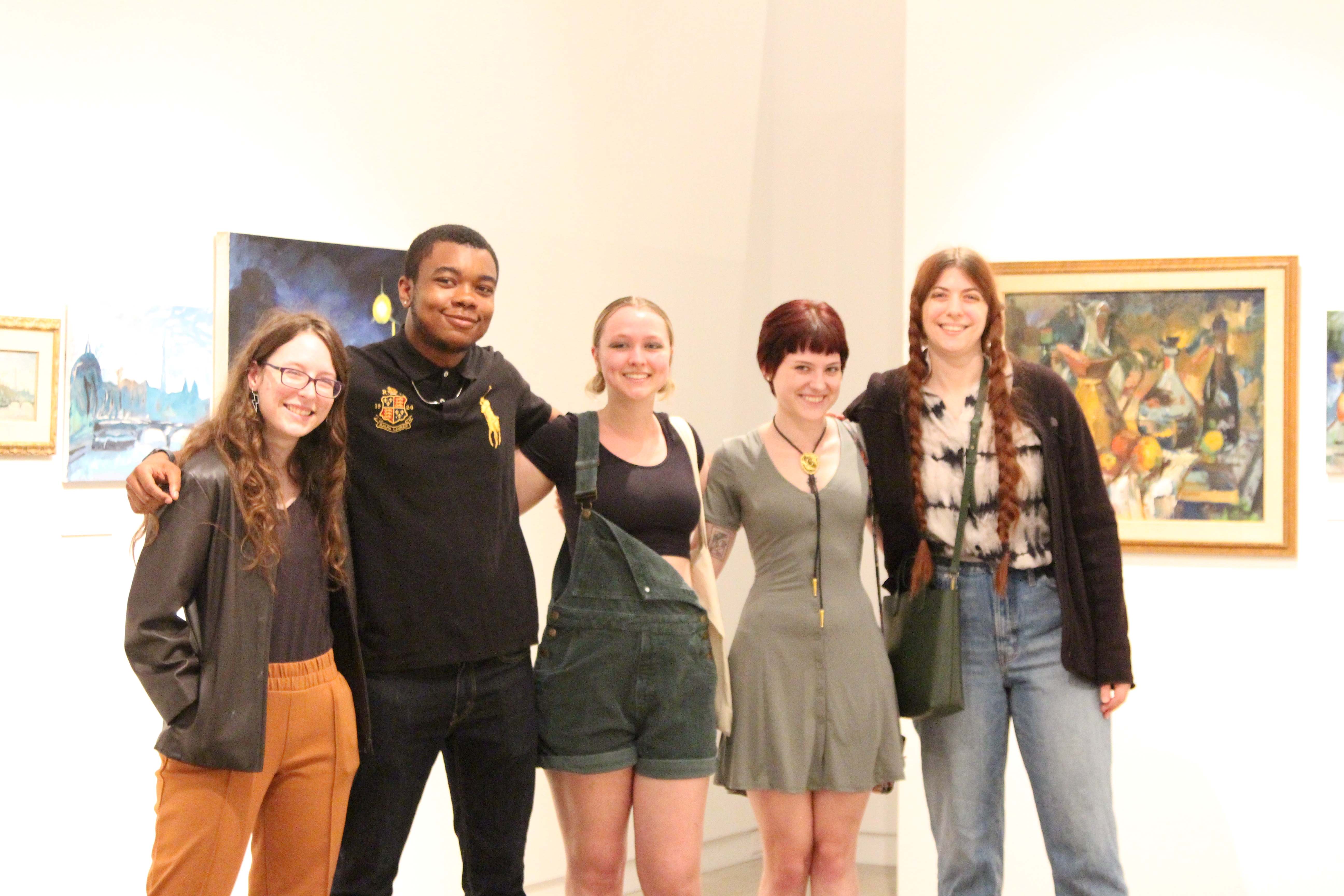 Student artists with professor